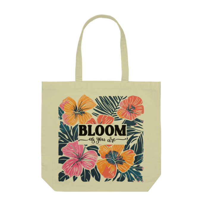 A vibrant Bloom As You Are Boho Flower Tote Bag with floral patterns on sturdy canvas fabric.