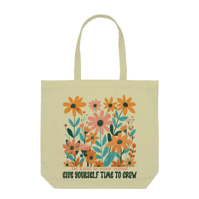 A boho-inspired Be Kind to Your Mind Give Yourself Time to Grow Boho Flower Tote Bag with delicate floral patterns on sturdy canvas fabric.