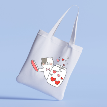 Tote bag featuring a cat opening a jar of love hearts.